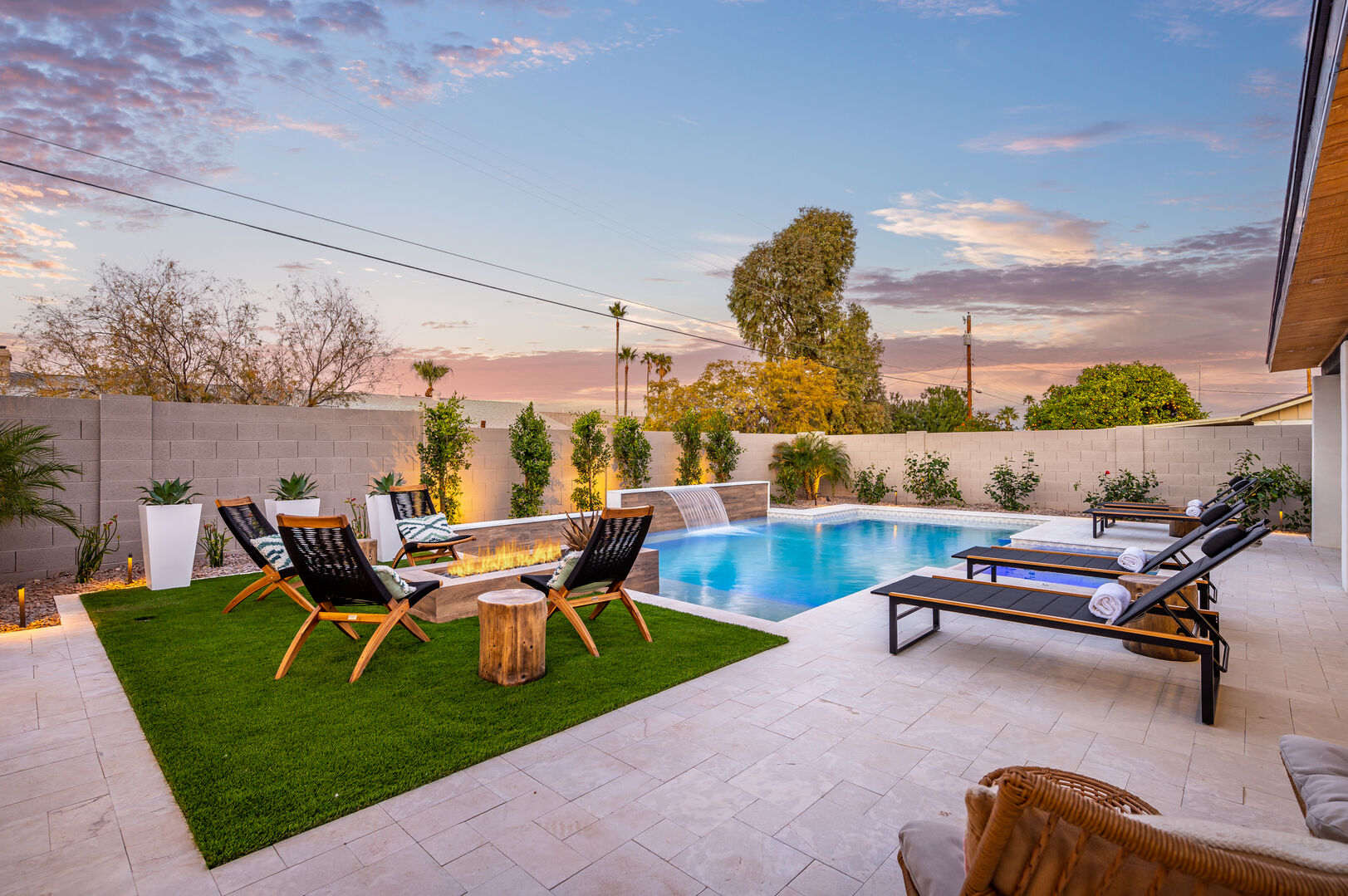 Gather around the fire pit or lounge by the pool.