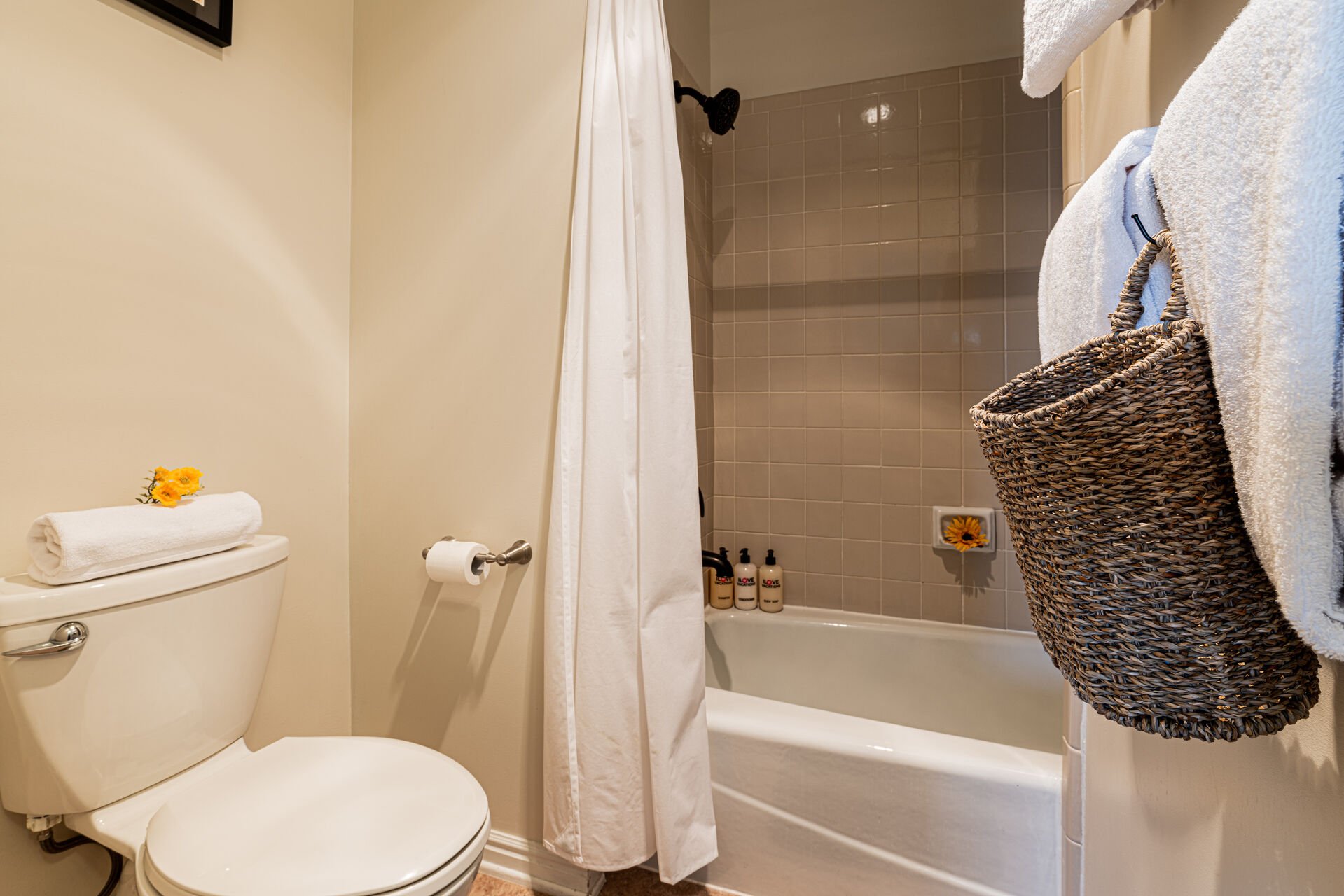 Full Shared Bath with a Tub/Shower Combo