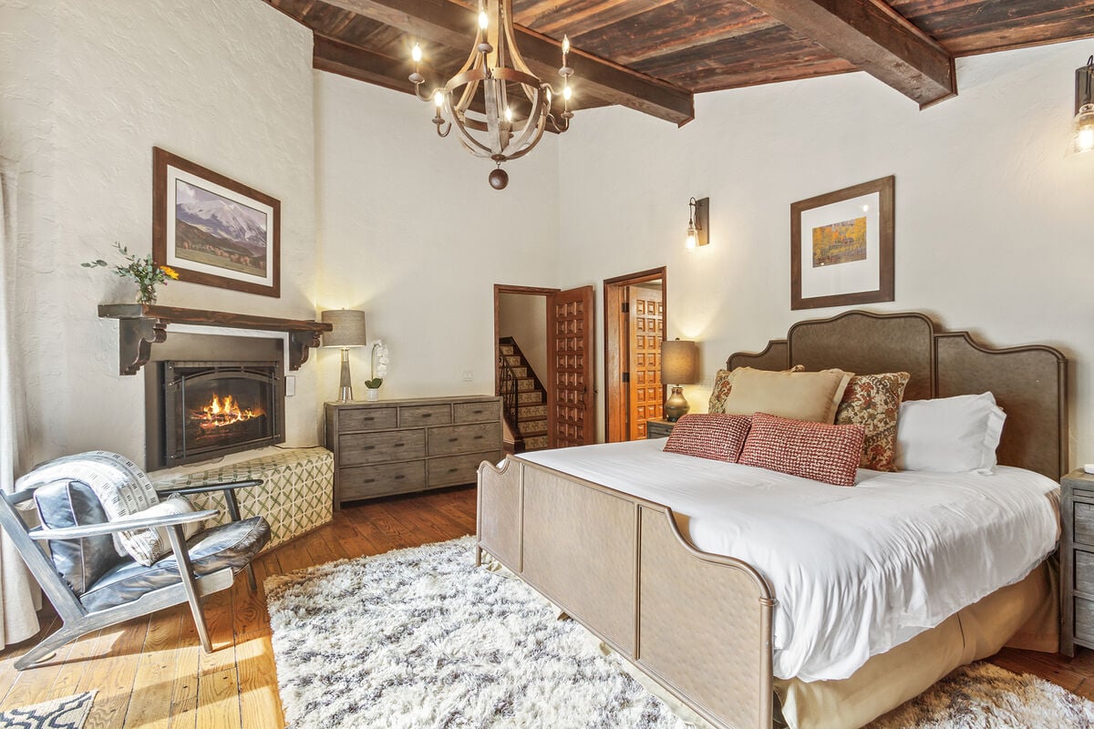 Two incredible master suites add to the luxury and exclusiveness of the Chateau.  This suite features  full walk out sliding glass doors to the bubbling creek and hot tub.  Imagine sleeping to ambient sounds of nature flowing by.