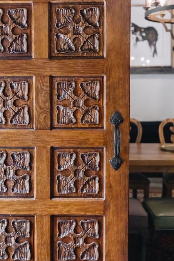 Artistry in Woodwork: The hand-carved doors and intricate woodwork throughout the home are a testament to craftsmanship and attention to detail.  