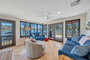 Nicely decorated and spacious sunroom for when you want to be outside but also be in the A.C.