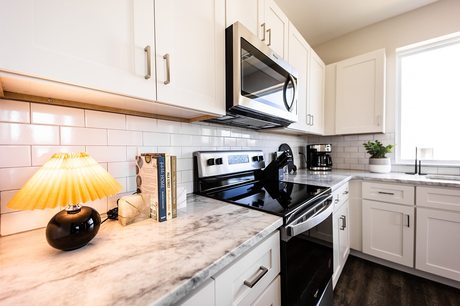 Fully equipped kitchen stocked with your basic cooking essentials. Complete with stainless steel appliances and breakfast bar seating.