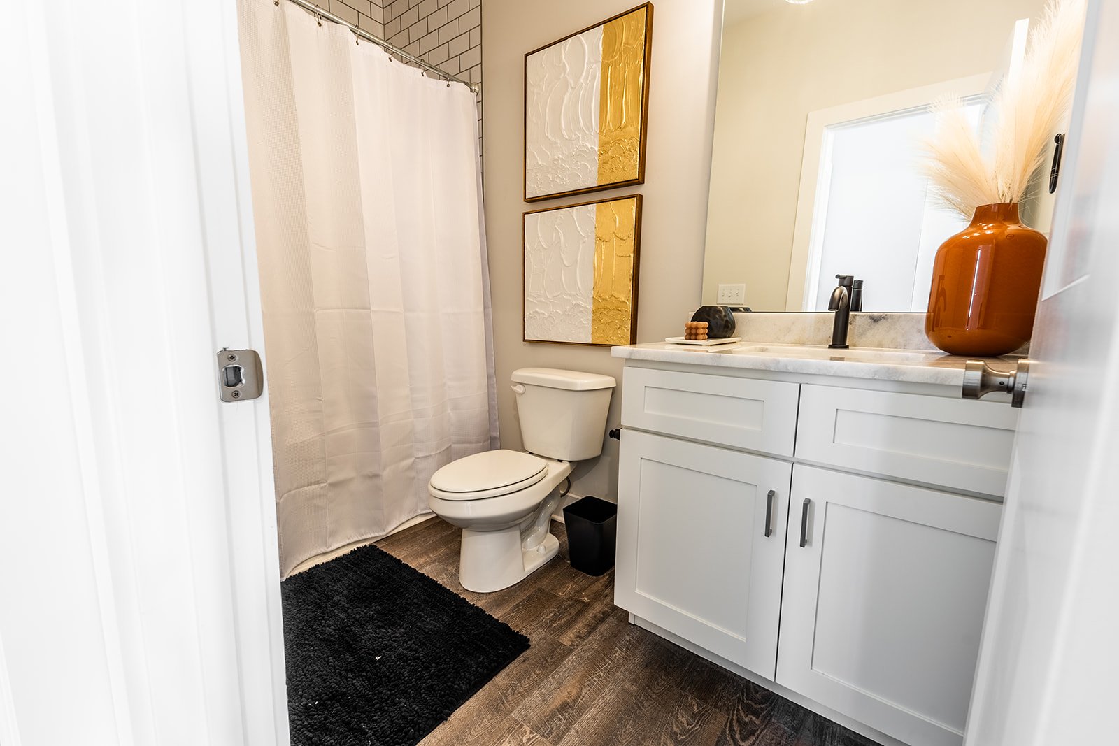 2nd Floor Shared Hallway Full Bathroom featuring Single Vanity and Shower/Tub Combo. (2nd Floor)