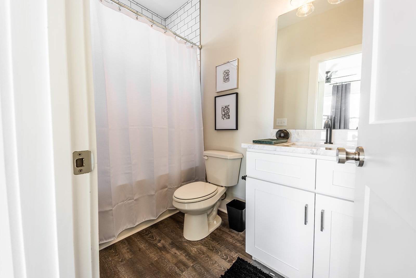 2nd Bedroom En-Suite Full Bathroom featuring single vanity and shower/tub combo. (3rd Floor)