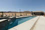 Private pool (pool heating available with fee) & hot tub, with ample lounging, seating, dining, and fire pit