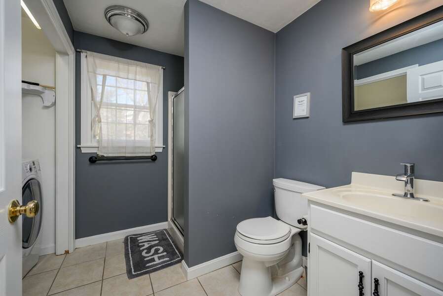 Bathroom #1 has plenty of space, a shower and laundry area as well - 102 White Rock Road Yarmouth Port Cape Cod - Vacation Station - NEVR