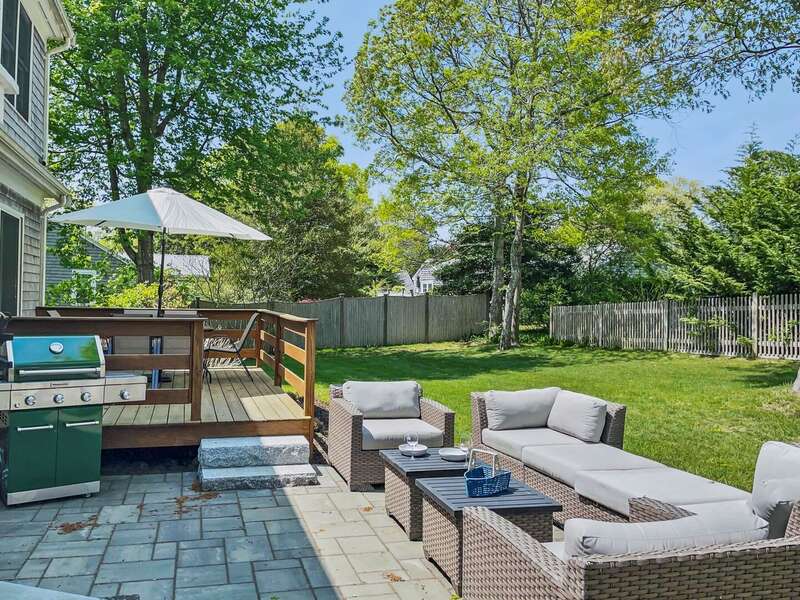 Close proximity between outdoor living spaces allows for inclusive conversation to continue -102 White Rock Road Yarmouth Port Cape Cod - Vacation Station - NEVR