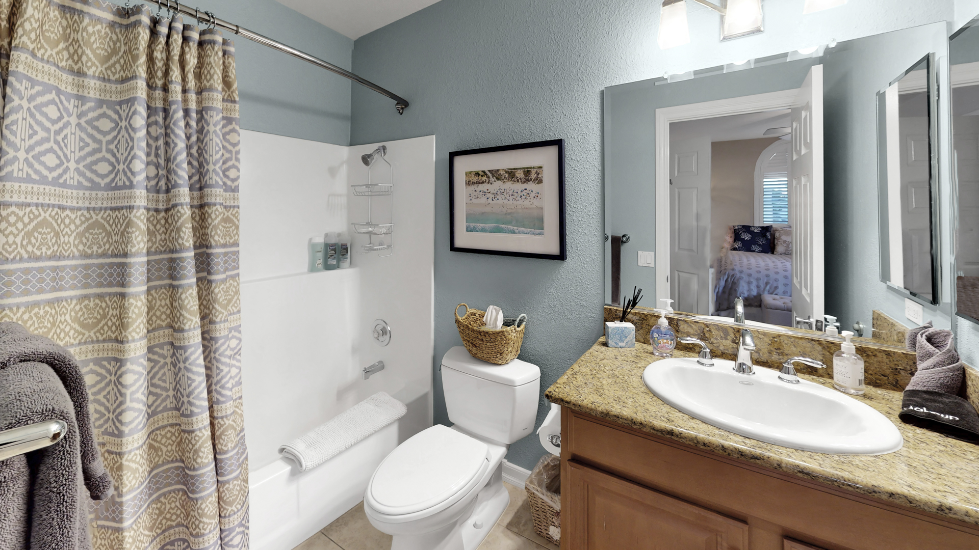 Master in-suite bathroom with shower-tub combo