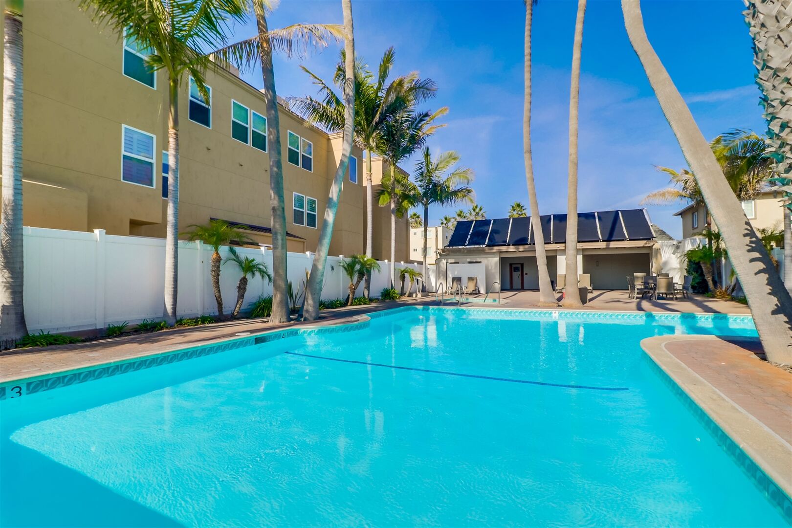 Capri by the Sea has a private pool and hot tub area accessed with guest fob only. Located on the ground floor just behind the complex about half way on the block. Pool is heated year round!