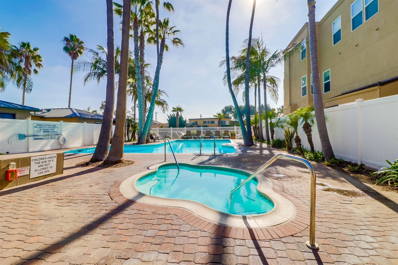 Capri by the Sea pool and hot tub area located on the ground floor behind the complex about half of a block away.