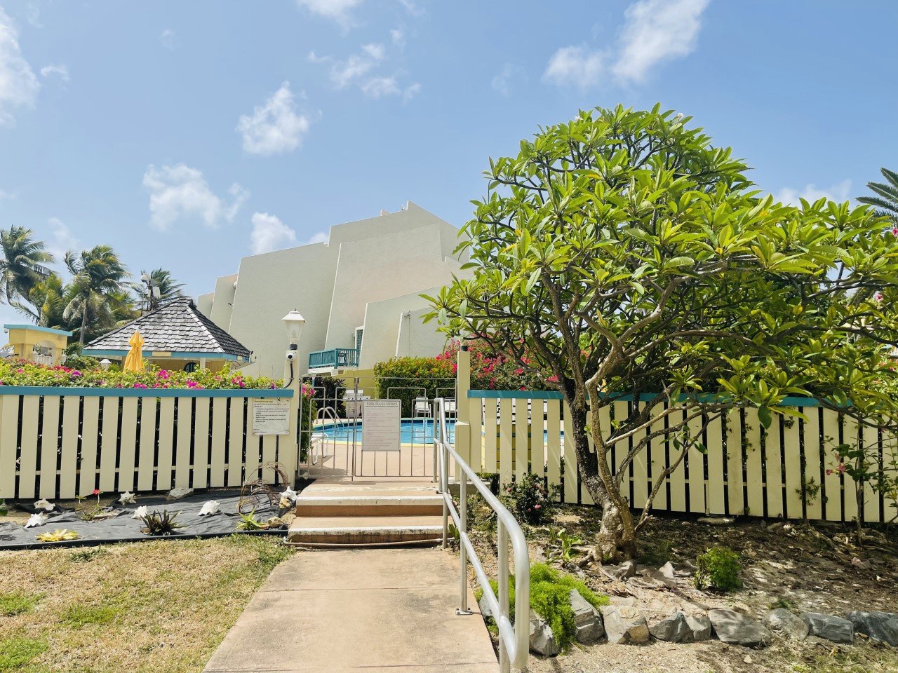 Entrance to the Pool of Colony Cove Condominiums!