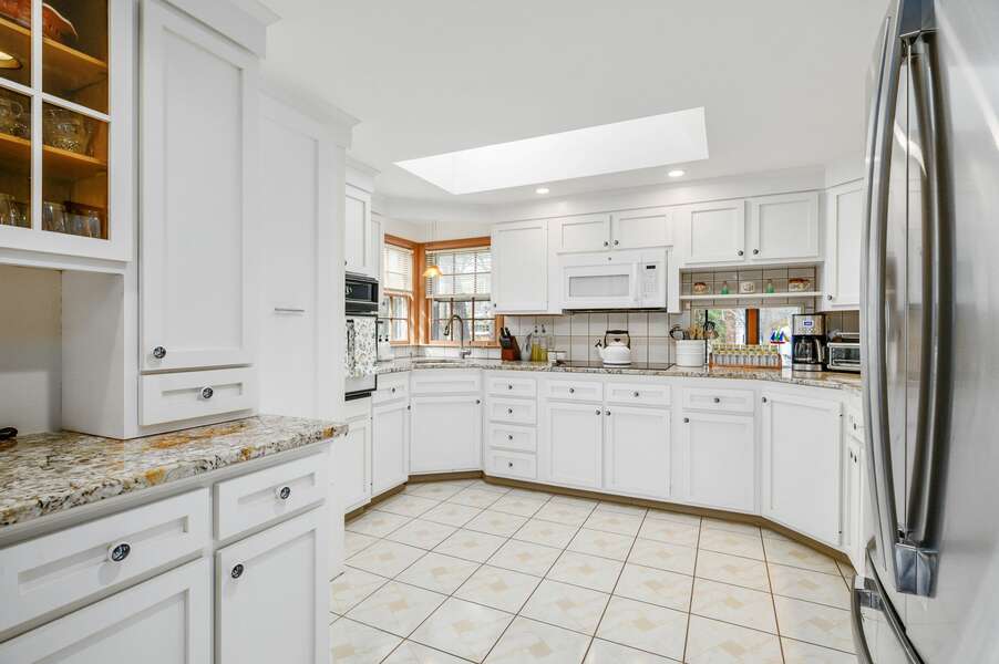 Beautiful custom kitchen bathed in sun from the skylight - 20 Vacation Lane Harwich Cape Cod - At Last - NEVR