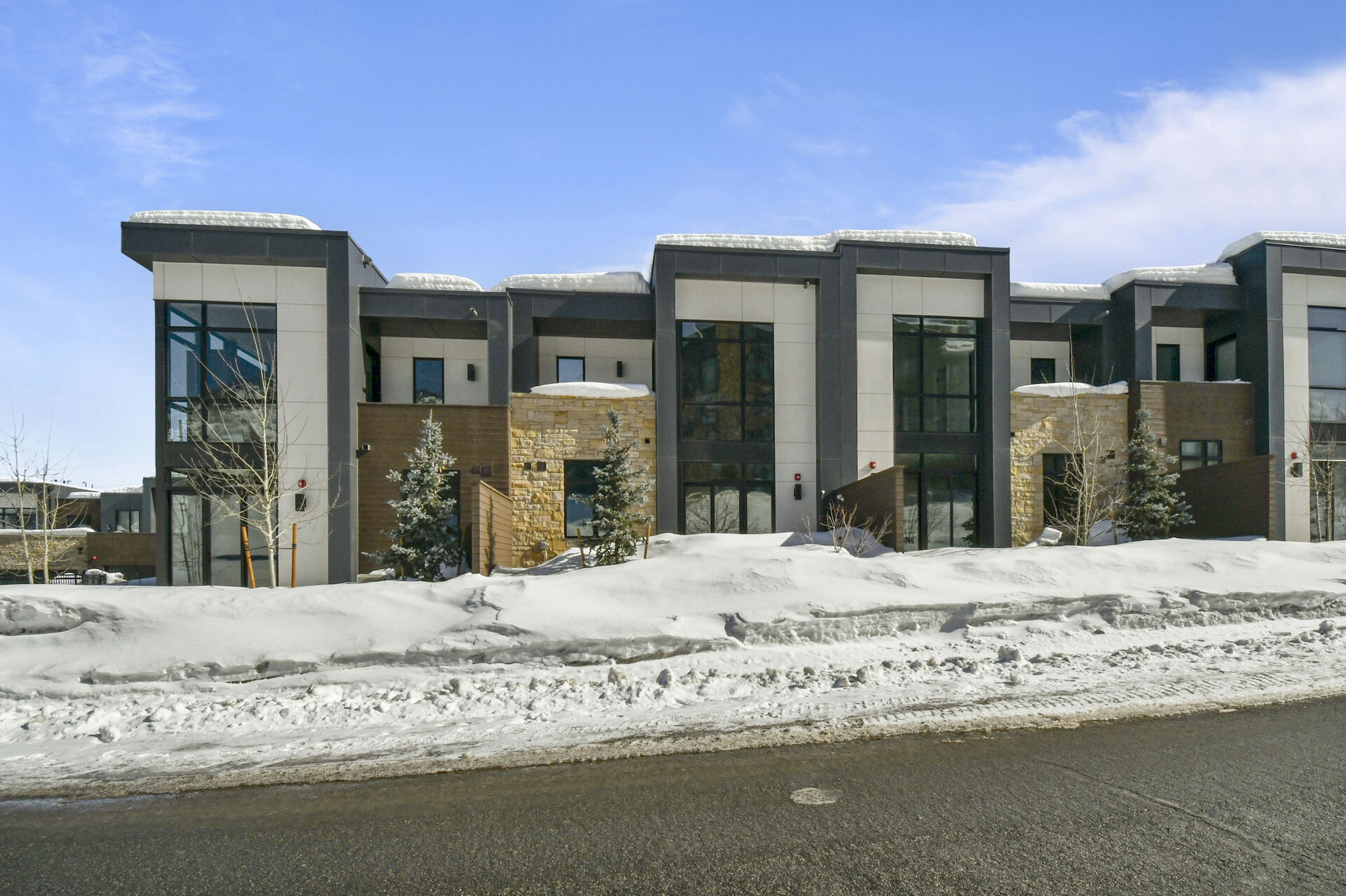 Front of unit, large glass windows that are mirrored for privacy