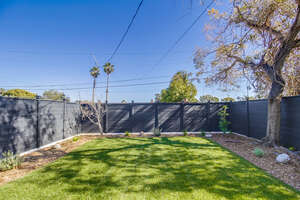 Fully fenced in backyard space