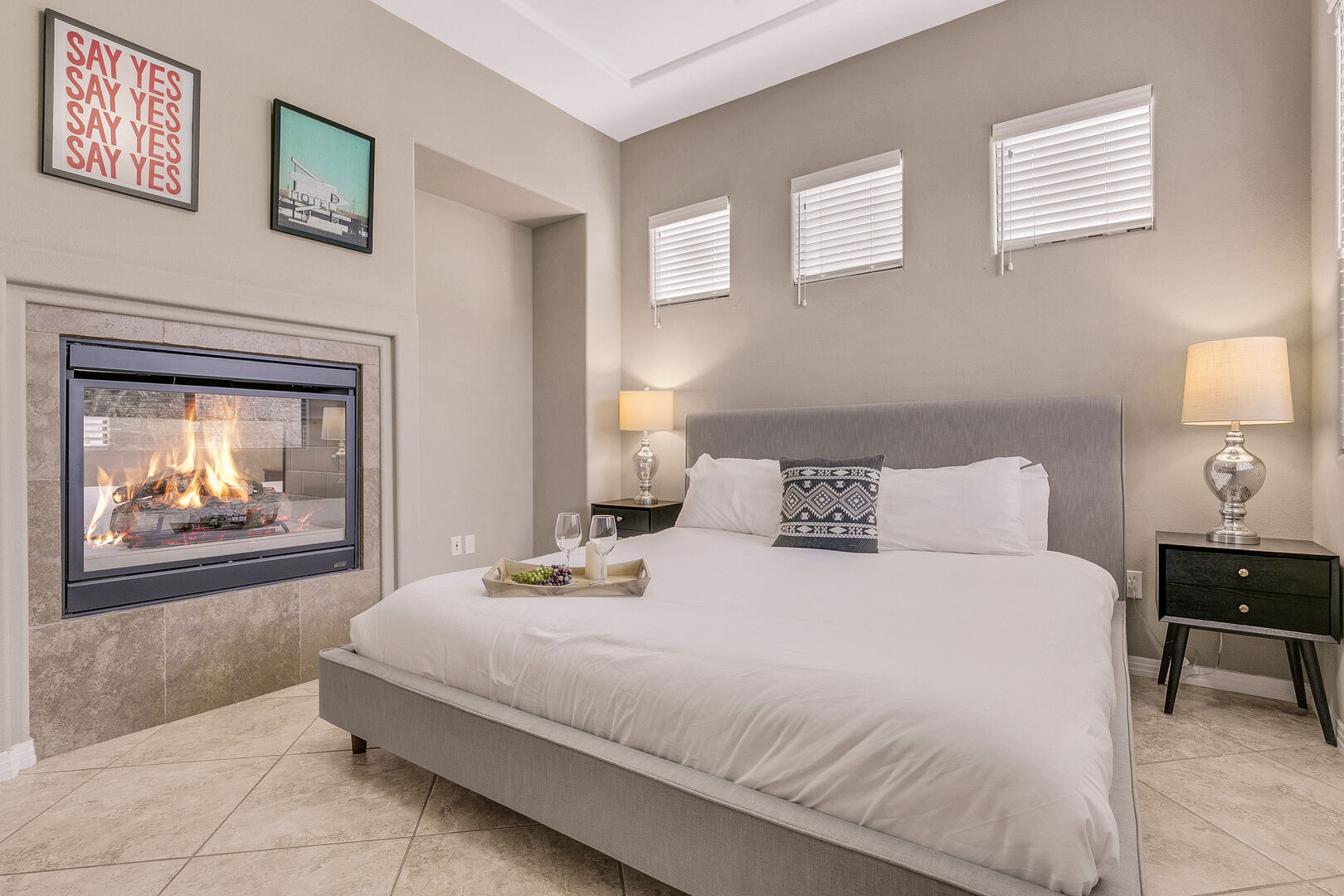 Detached Casita Suite 5 is accessible through the backyard and features two King-sized Beds and a double-sided fireplace.