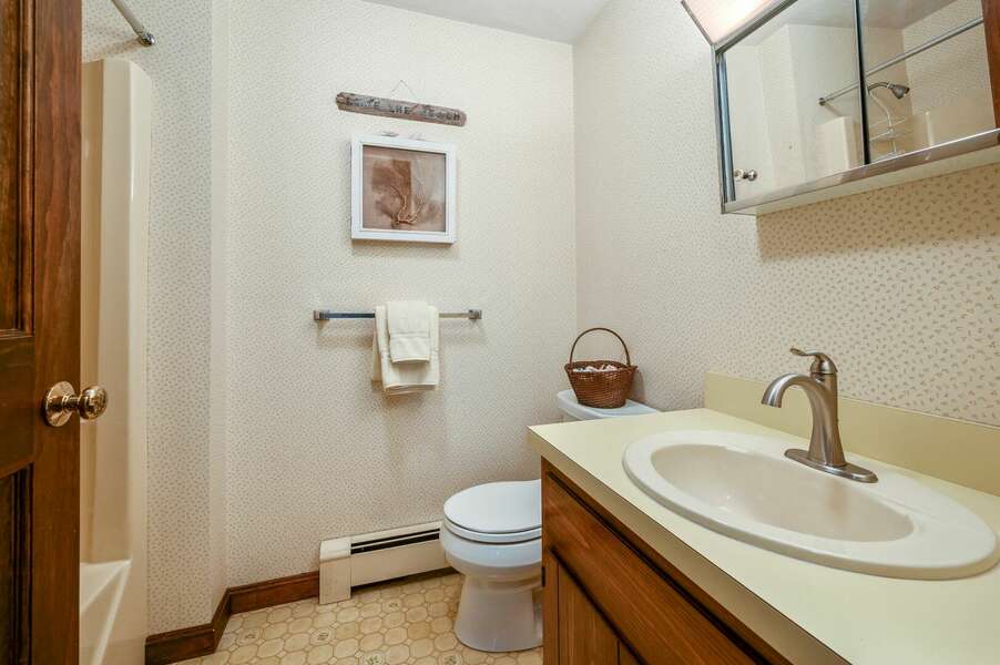 Bathroom #1 with tub/shower combination and a small stool (not pictured) to make access easier for children - 47 Whidah Drive Harwich - The Wicked Whidah - NEVR