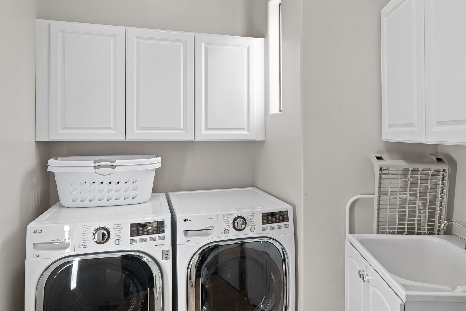 High End Washer Dryer in spacious linen room