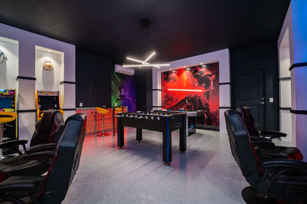 Themed space with air hockey, foosball, gaming stations and arcade games.