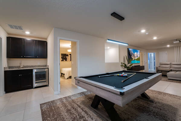 Loft space with kitchenette and pool table