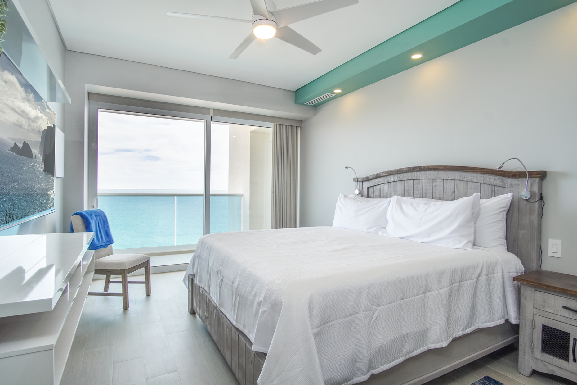 Tow of the three bedrooms open onto the ocean front patio