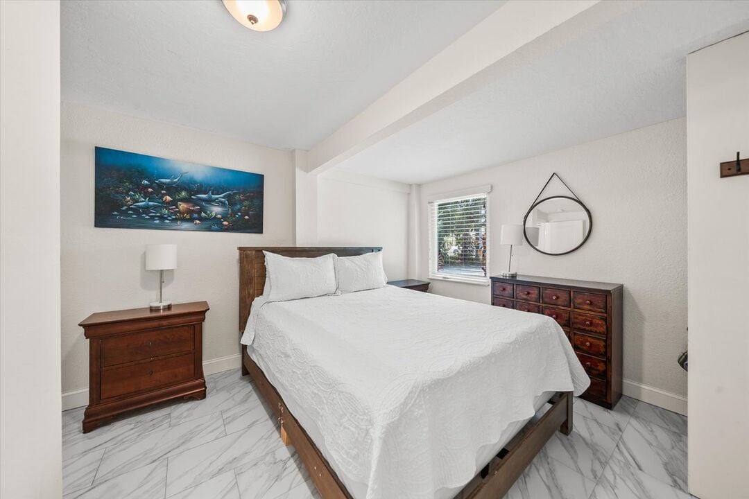 Bedroom in queen-sized bed.