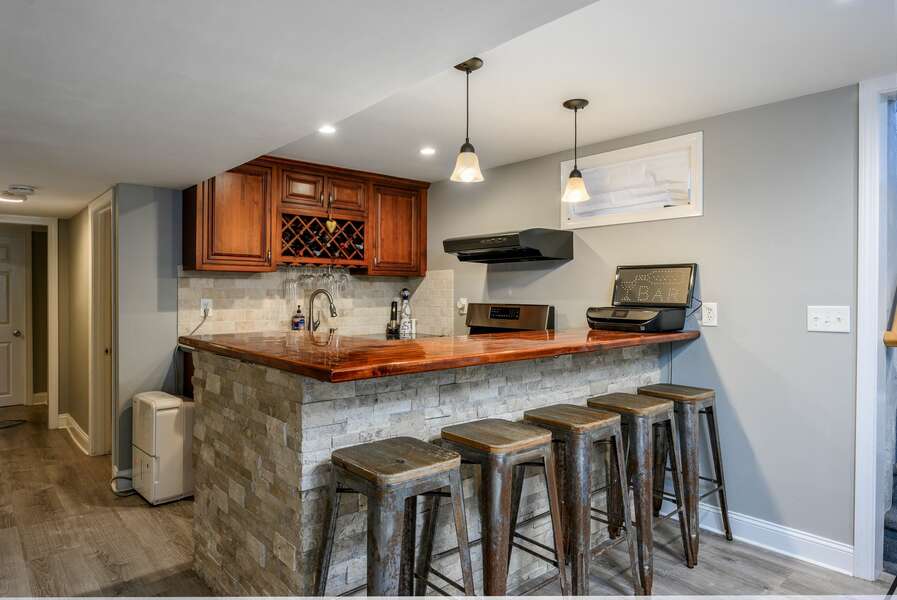 Lower level entertaining space with kitchen and bar - 176 Sudbury Lane Hyannis Cape Cod - Family Tides - NEVR