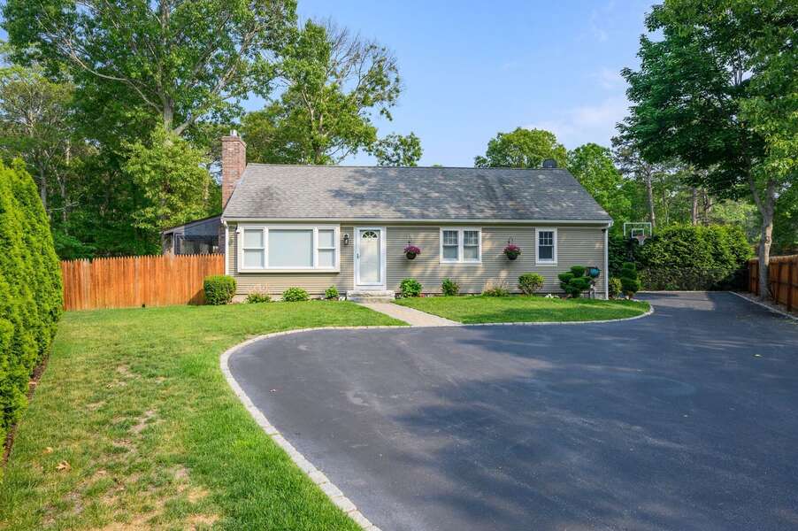 Large driveway with basketball area at the end on the right of the home - 176 Sudbury Lane Hyannis Cape Cod - Family Tides - NEVR