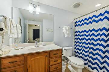 Master bathroom with a shower / tub combo