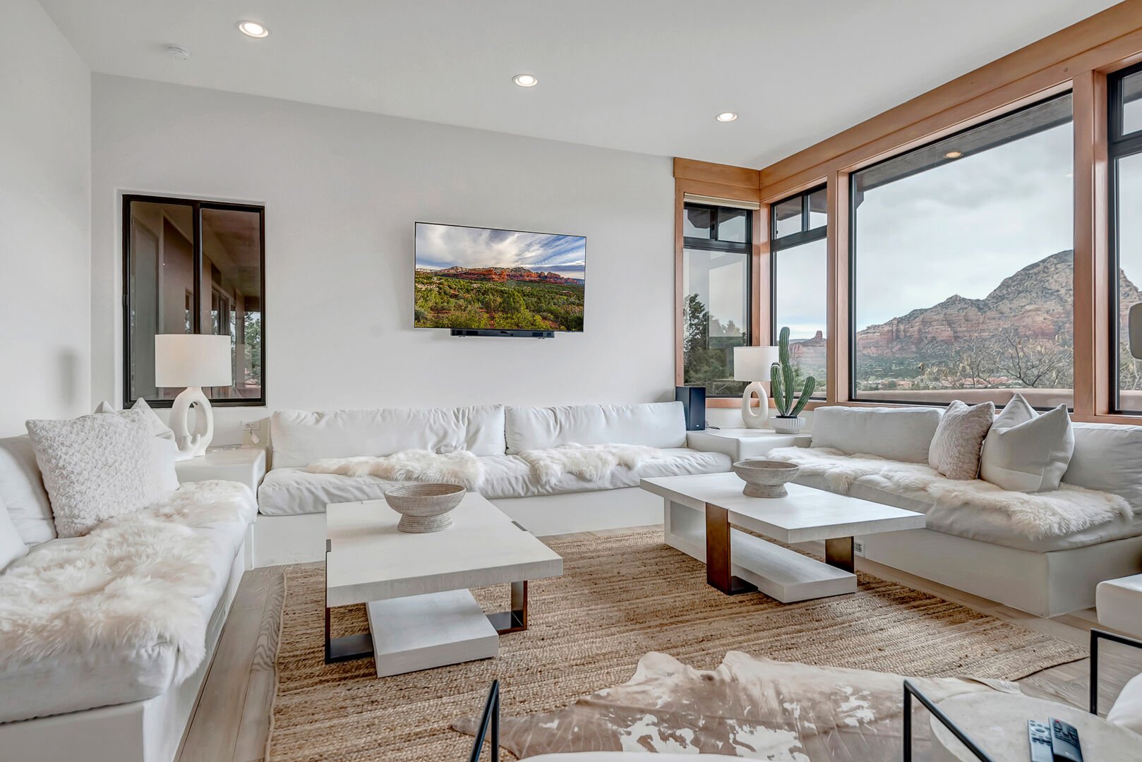 Modern Living Room with Lots of Seating, Smart TV and Gas Fireplace