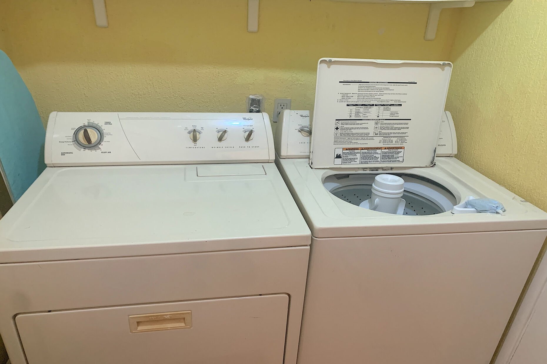 washer and dryer in a separate utility room