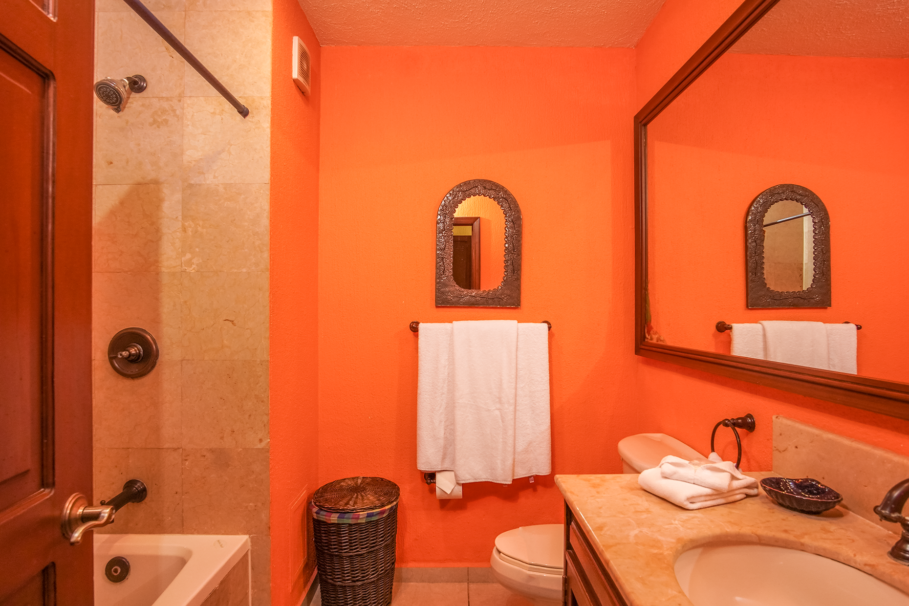 bright orange guest bathroom