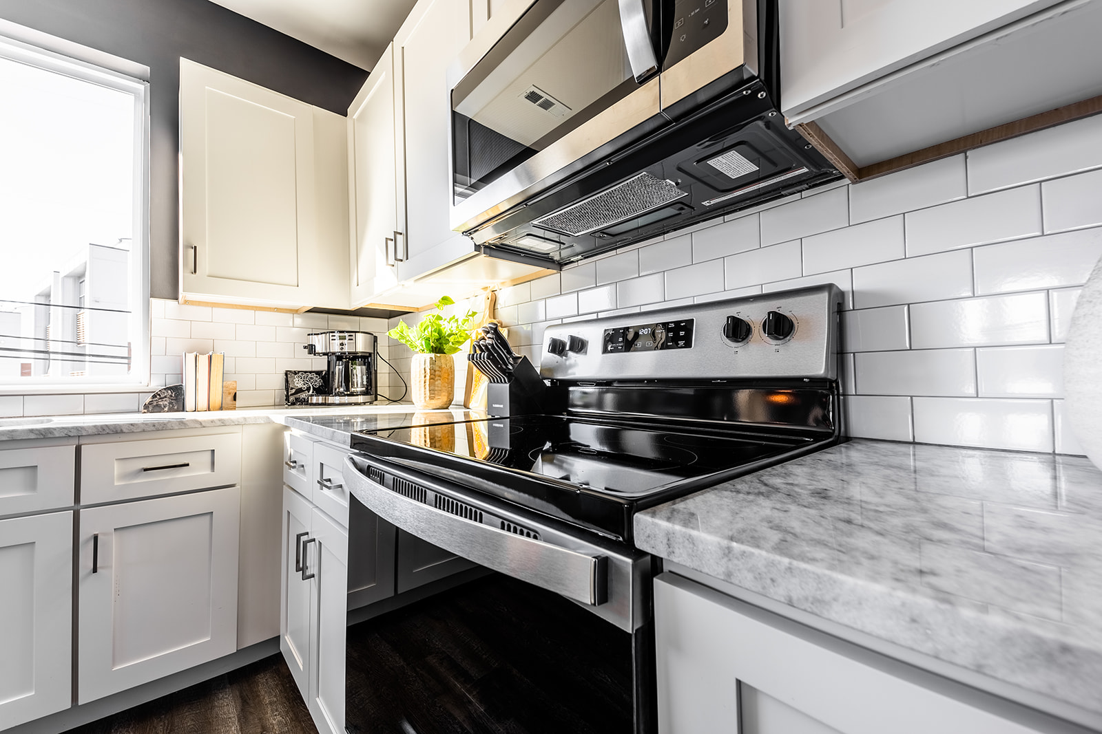 Unit 1: Fully Equipped Kitchen stocked with your basic cooking essentials and stainless-steel appliances. (2nd Floor)