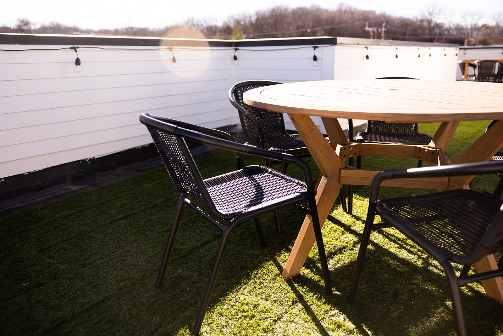 Unit 2: Private rooftop deck with lounge area, and outdoor dining. (4th floor)