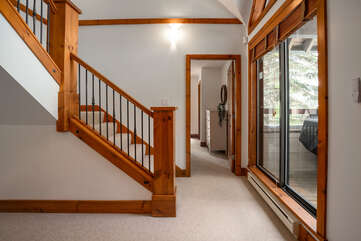 Stairs to lofted area and third bedroom