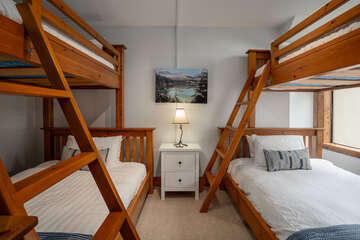 Second bedroom with twin over double bunks (top bunks for children only)