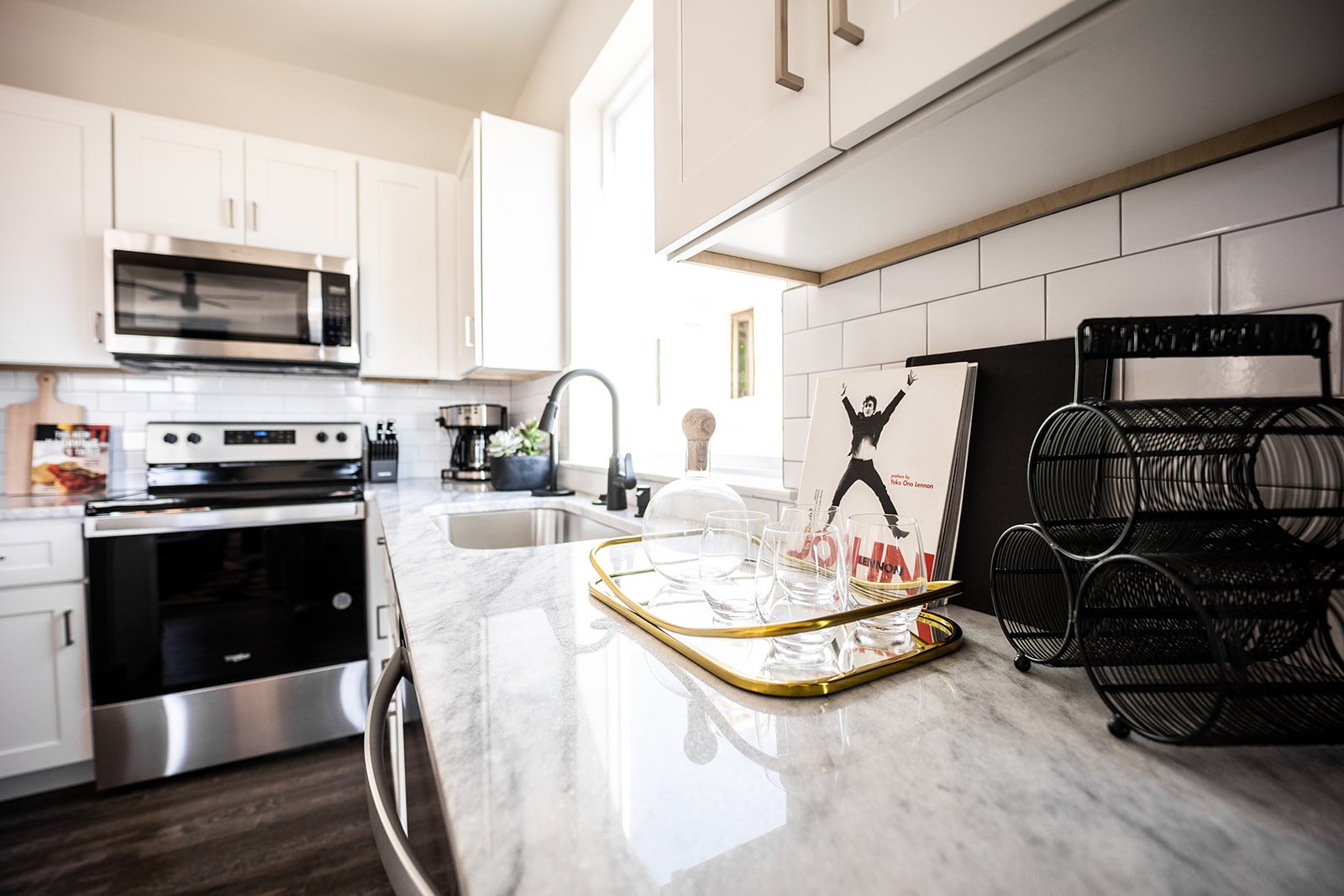 Unit 2 - Fully equipped kitchen stocked with your basic cooking essentials. Complete with stainless steel appliances and breakfast bar seating. (2nd floor)