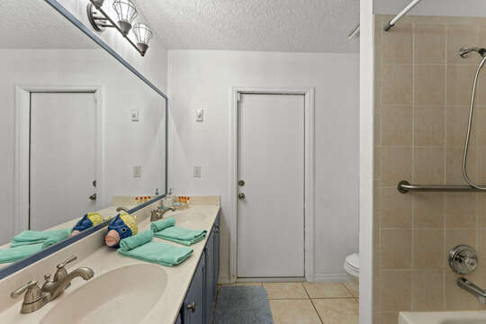 Guest bathroom with door to outside