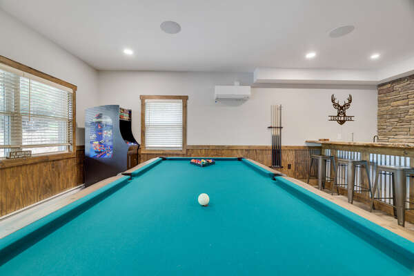 Fun and Games
With a Pool Table, Old School Arcade Game and Bar in the Game Room, No One Will Be Bored.