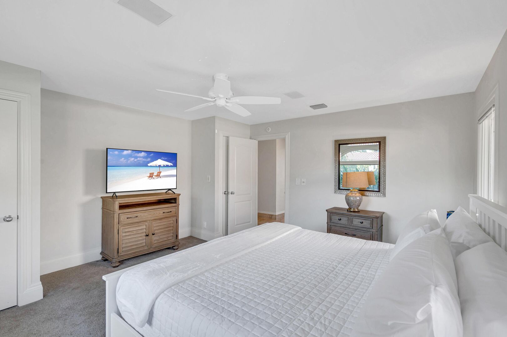 Bedroom Four offers a king size bed, smart TV.