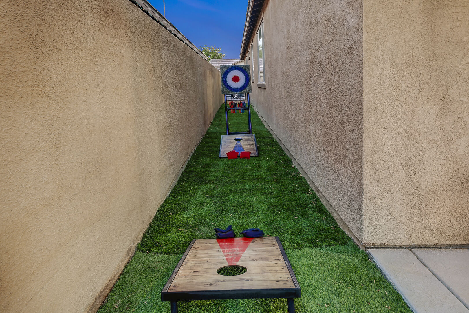 Show off your skills in the axe throwing game and classic game of bean bag toss.