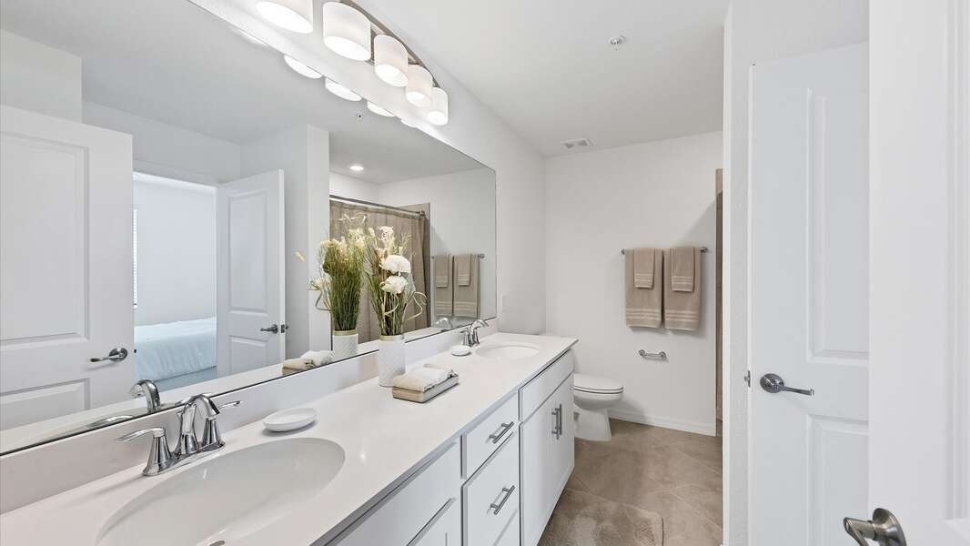 Guest bathroom with dual sinks
