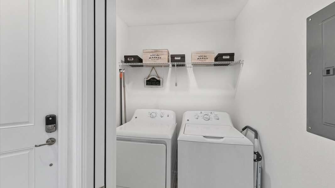 Full size washer and dryer in the laundry room in the unit