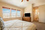 Master Bedroom with a King Bed and 55