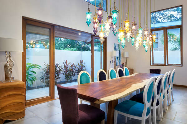 The dining area at Casa Breeze is a place where elegance meets comfort.