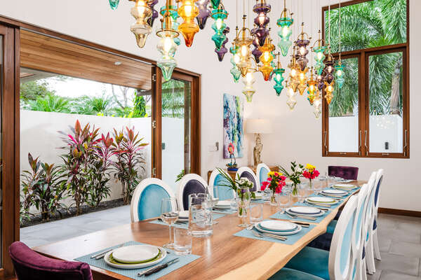 The dining area at Casa Breeze is a place where elegance meets comfort.
