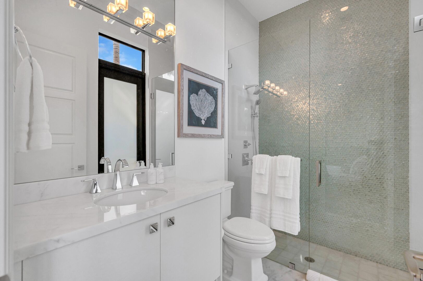 The bathroom of the seventh bedroom features a walk-in shower.