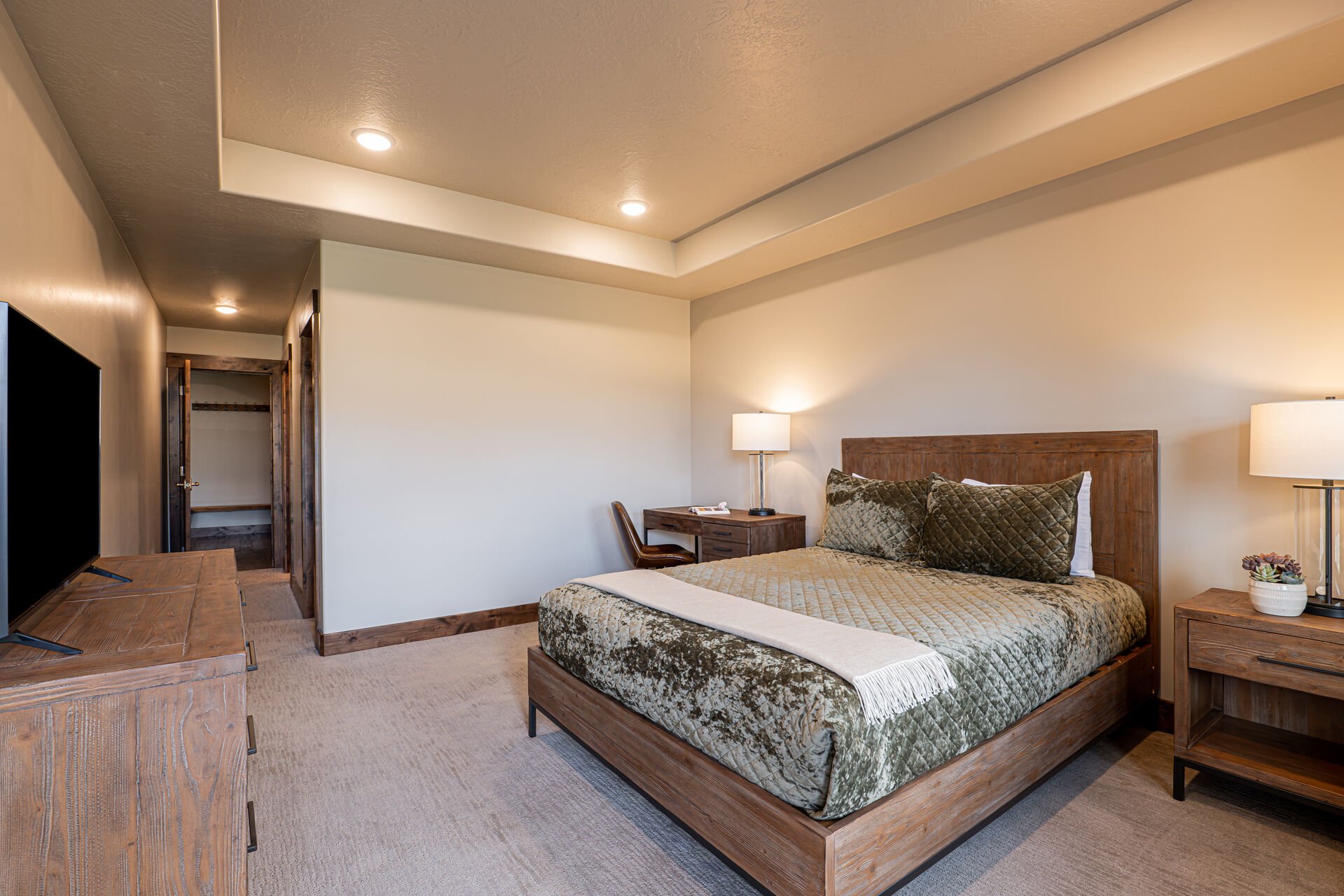 Master Bedroom with a Queen Bed and Smart TV