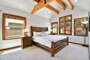 Master bedroom with King Bed and vaulted ceiling