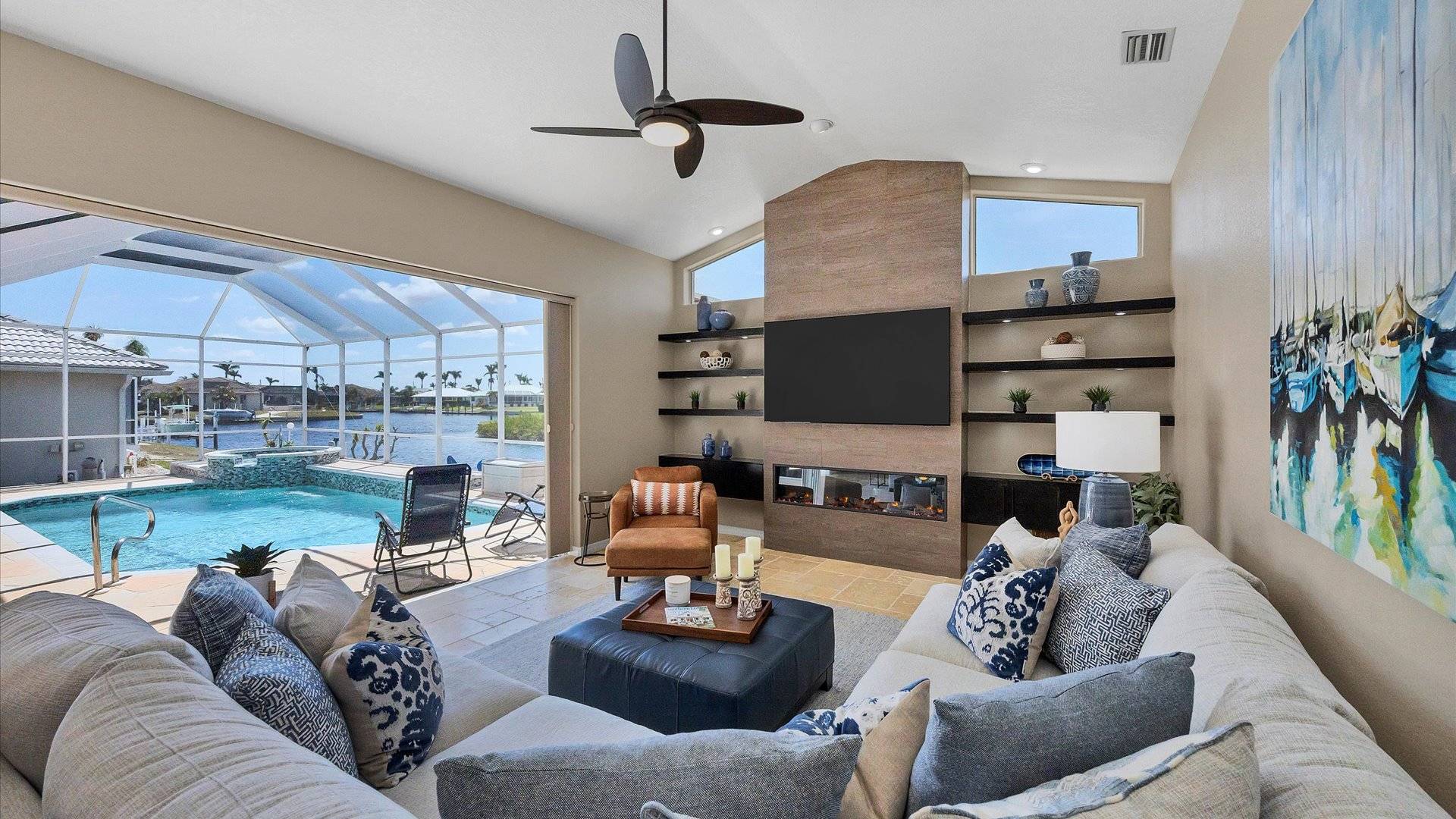 Incredible recently redone family room overlooking the lanai and pool