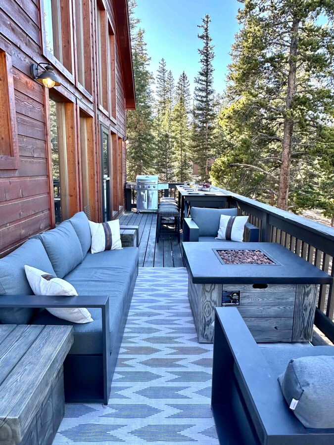 Gas fire pit with outdoor seating areas to enjoy on the deck as well.  Hot tub is now in the location that you see the BBQ in this pic.